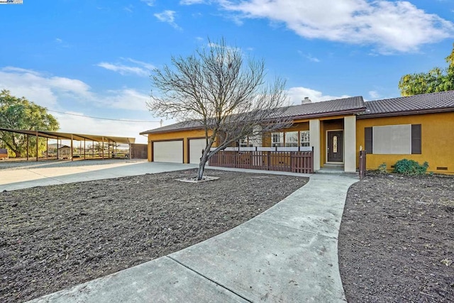 view of front of home with a garage