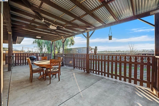 view of patio / terrace featuring ceiling fan