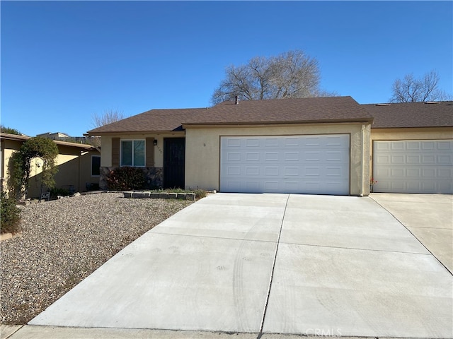 ranch-style house featuring a garage