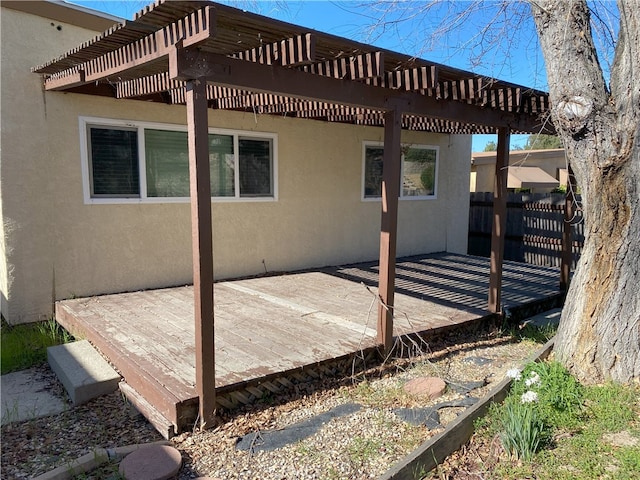 wooden deck with a pergola