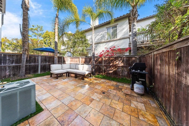 view of patio / terrace with central air condition unit, an outdoor living space, and area for grilling