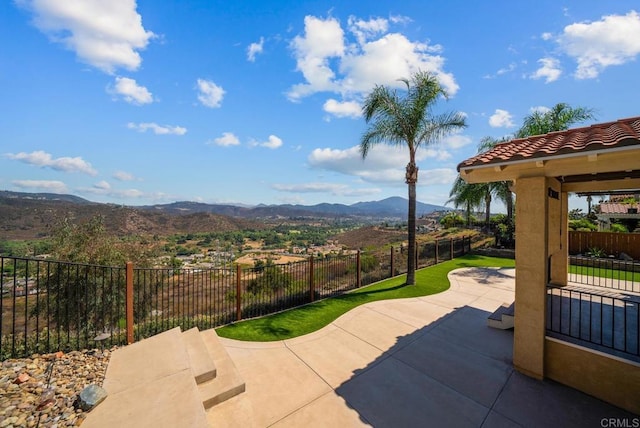 view of patio with a mountain view