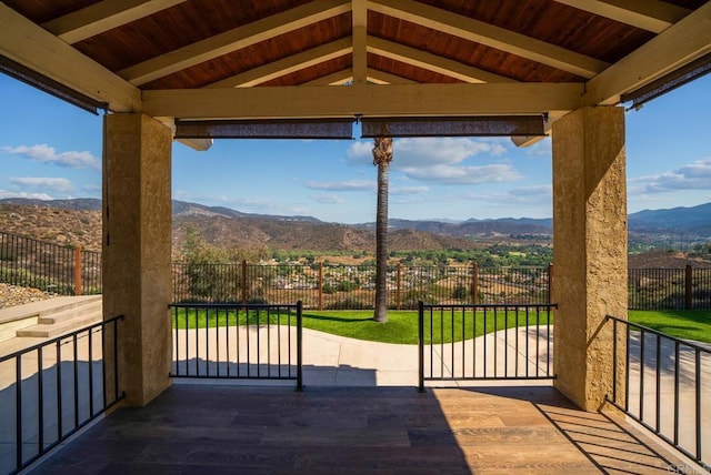 view of patio / terrace with a mountain view and a gazebo