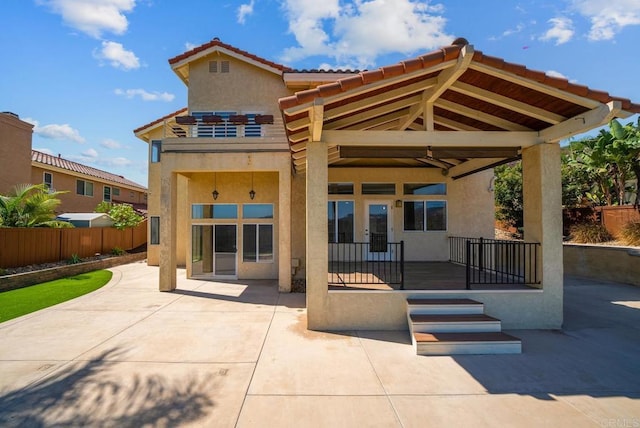 rear view of house with a patio