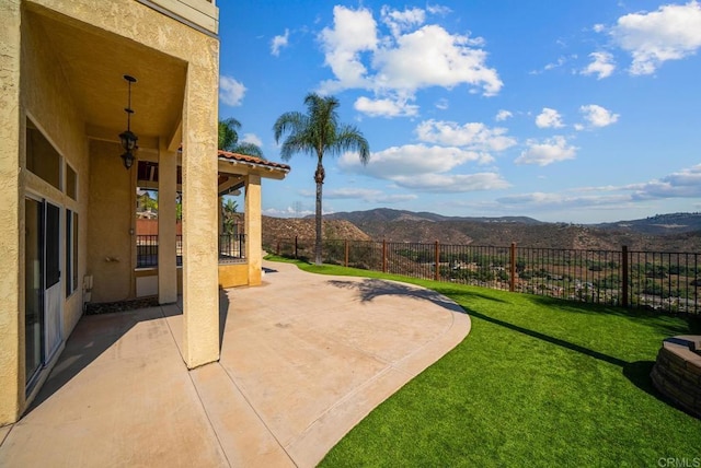 view of patio with a mountain view