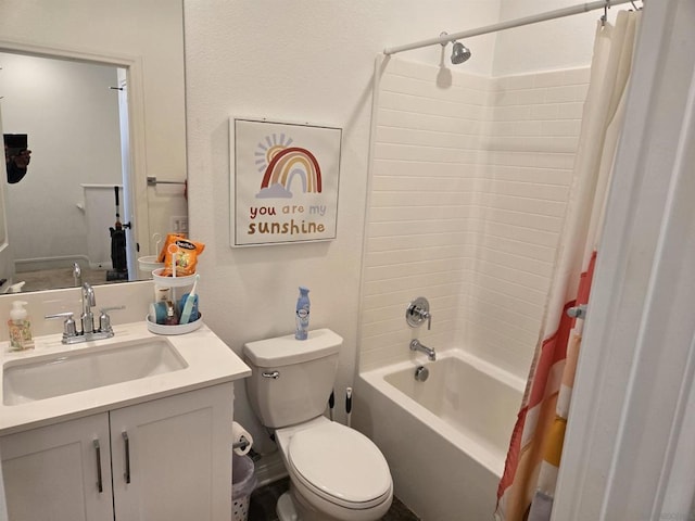 full bathroom featuring toilet, vanity, and shower / bath combo