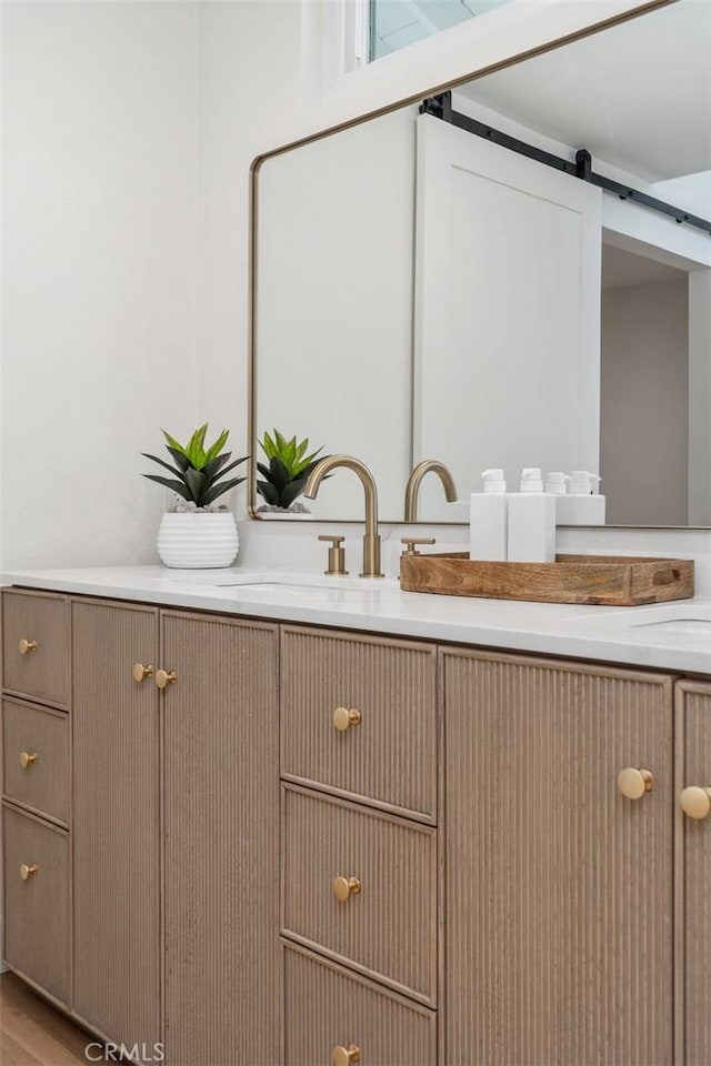 bathroom featuring vanity and wood-type flooring