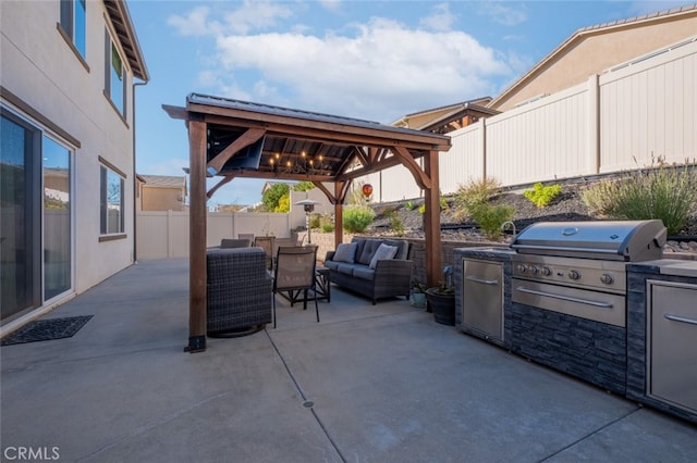 view of patio featuring a gazebo, a grill, outdoor lounge area, and area for grilling