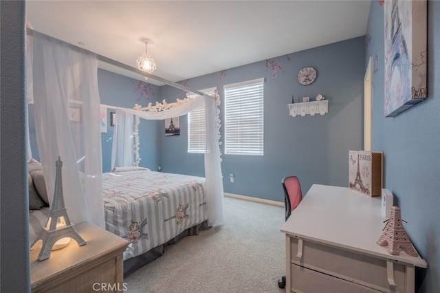 bedroom with light carpet