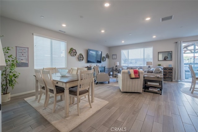 dining room with light wood-type flooring