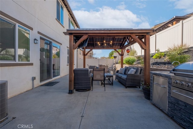 view of patio with an outdoor hangout area and a gazebo