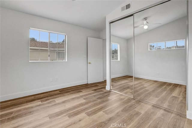 16096 Caminito Tomas, San Diego, CA 92128 - unfurnished bedroom with multiple windows, wood finished floors, lofted ceiling, and a ceiling fan