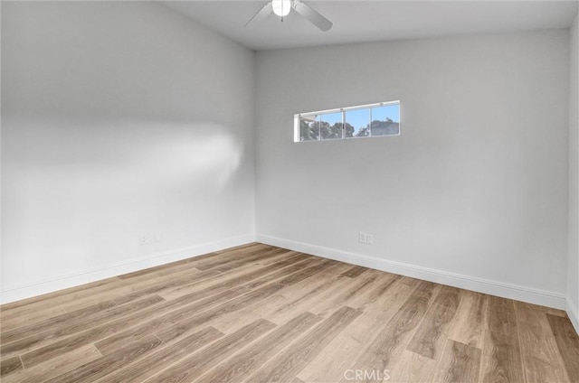 unfurnished room featuring ceiling fan and light hardwood / wood-style flooring