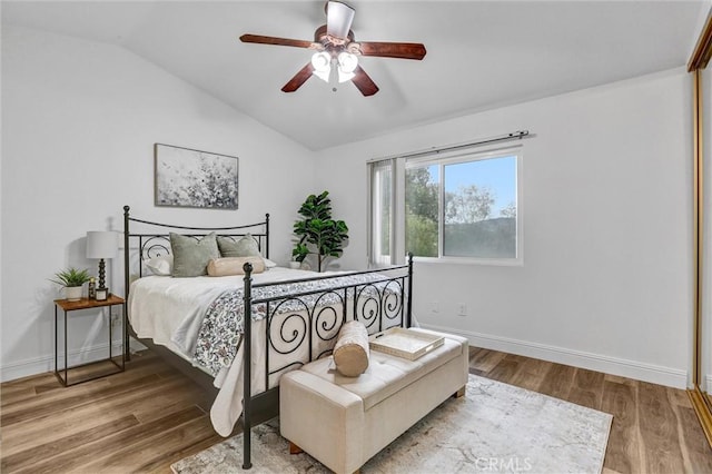 16096 Caminito Tomas, San Diego, CA 92128 - bedroom with vaulted ceiling, wood finished floors, and a ceiling fan