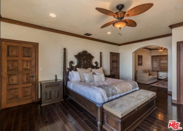 bedroom with ceiling fan and ornamental molding