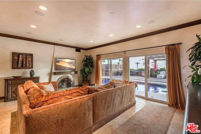 living room with light tile patterned flooring and crown molding