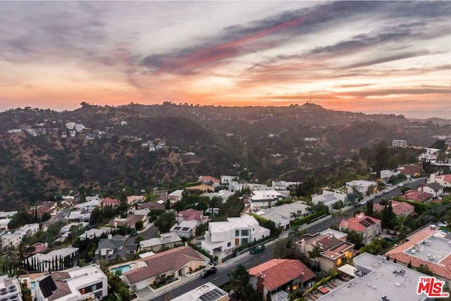 view of aerial view at dusk