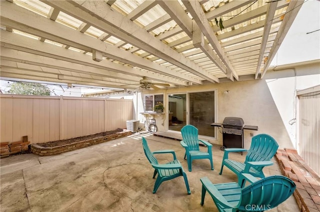 view of patio / terrace with ceiling fan, fence, area for grilling, and a pergola