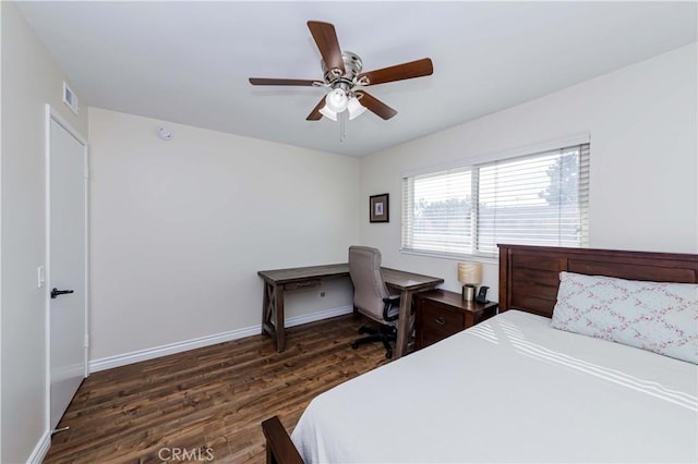 bedroom with visible vents, baseboards, ceiling fan, and dark wood-type flooring