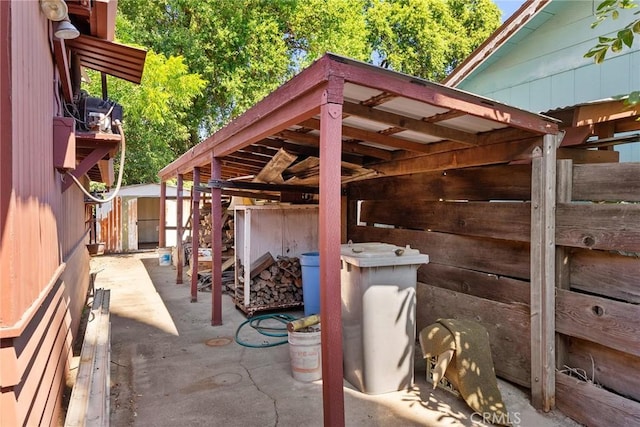 view of patio / terrace with a storage shed