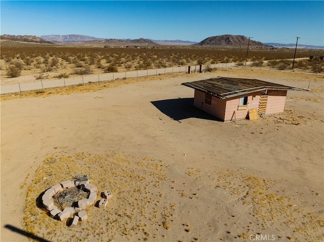 entry to storm shelter with a mountain view