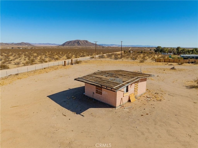 view of storm shelter featuring a mountain view