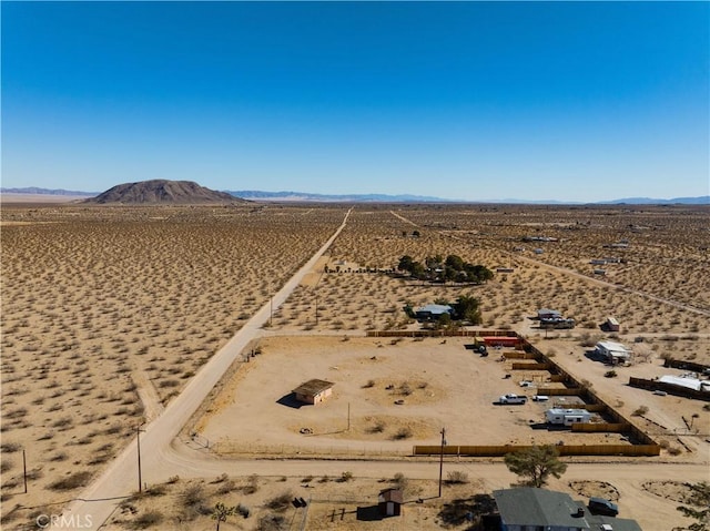 drone / aerial view featuring a mountain view