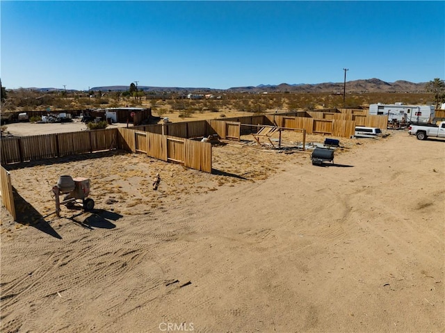 view of yard with a mountain view