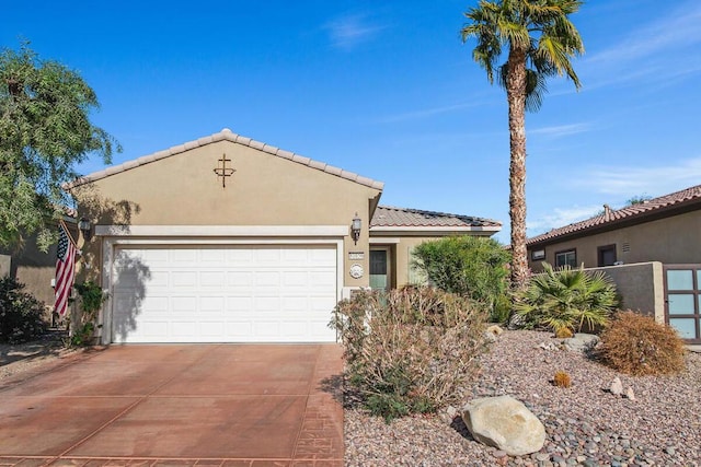 view of front of property with a garage