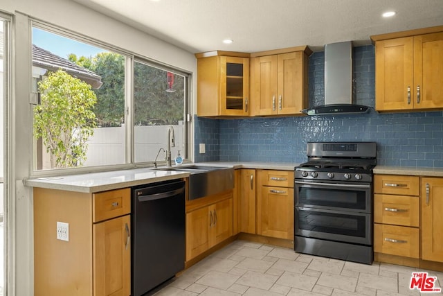 kitchen with backsplash, range with two ovens, dishwasher, and wall chimney exhaust hood