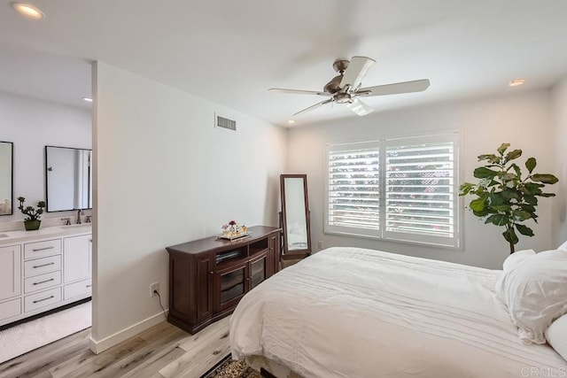 bedroom with ceiling fan and light wood-type flooring