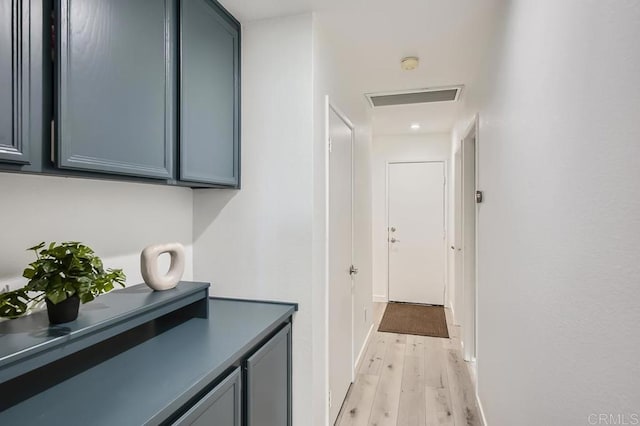 hallway featuring light wood-type flooring