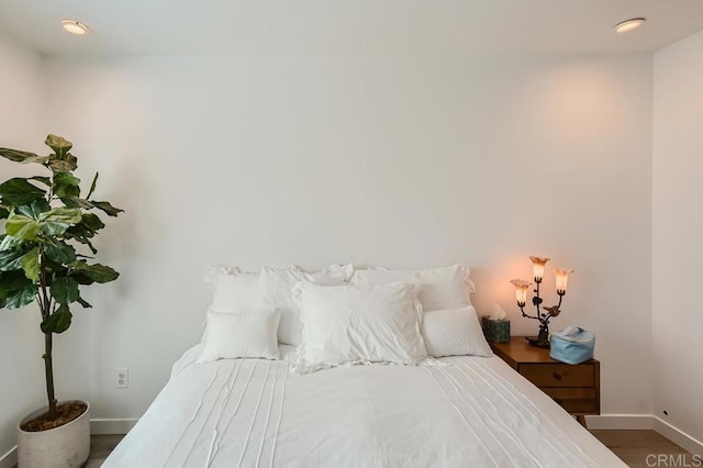 bedroom featuring hardwood / wood-style floors