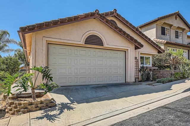 view of front of home with a garage