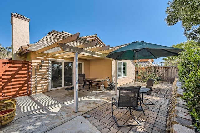 view of patio featuring a pergola