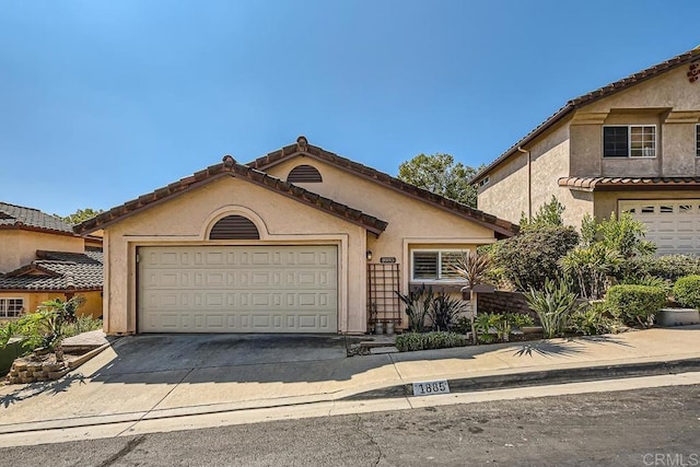 view of front of property with a garage