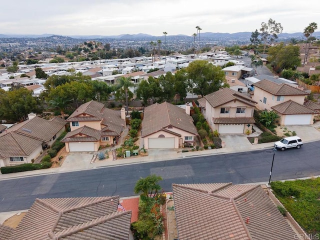 drone / aerial view featuring a mountain view