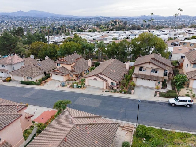 drone / aerial view featuring a mountain view