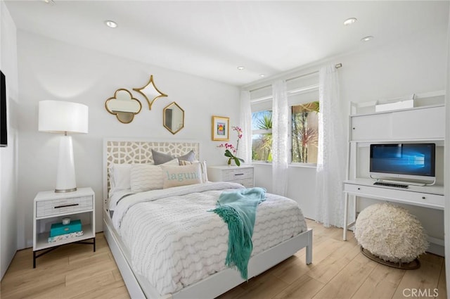 bedroom featuring light hardwood / wood-style flooring