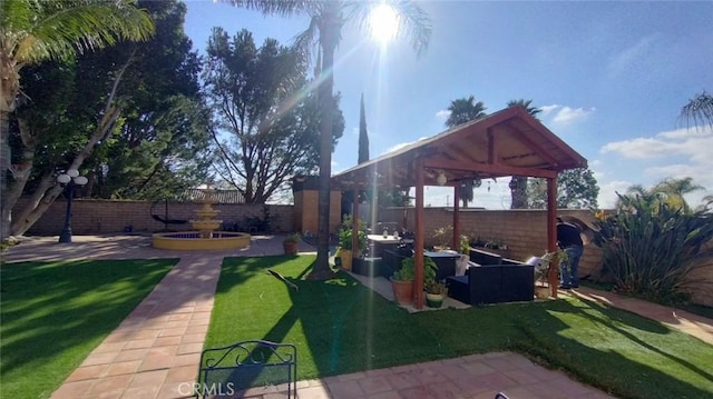 view of yard with a gazebo and a patio area