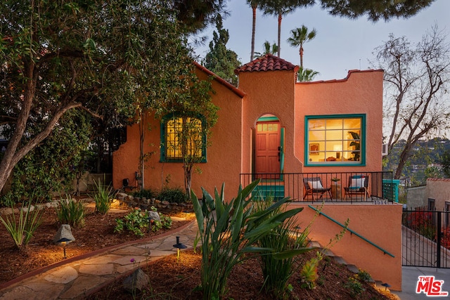 view of mediterranean / spanish-style house