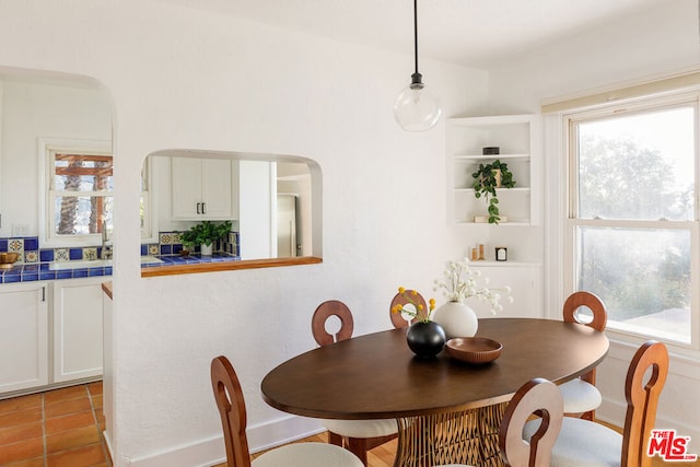 dining area with plenty of natural light