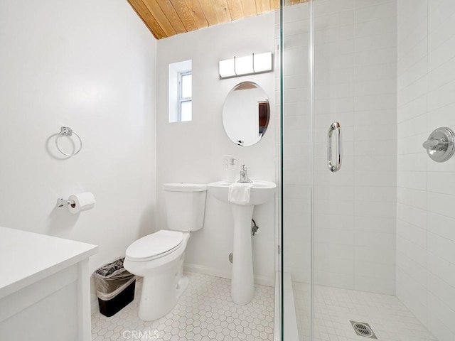 bathroom with toilet, an enclosed shower, and wood ceiling