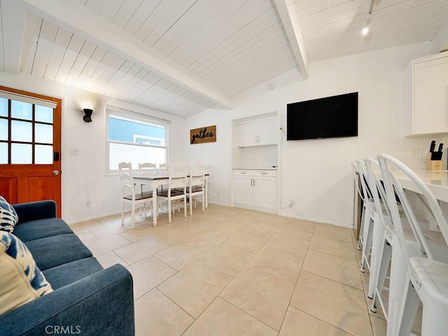 tiled living room featuring wood ceiling and lofted ceiling with beams