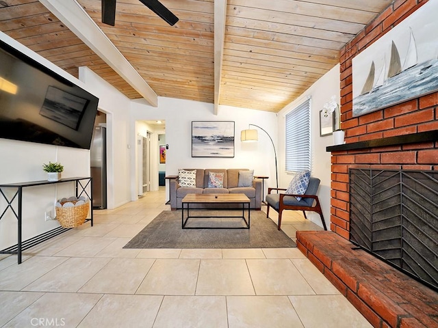 tiled living room with a brick fireplace, ceiling fan, lofted ceiling with beams, and wood ceiling