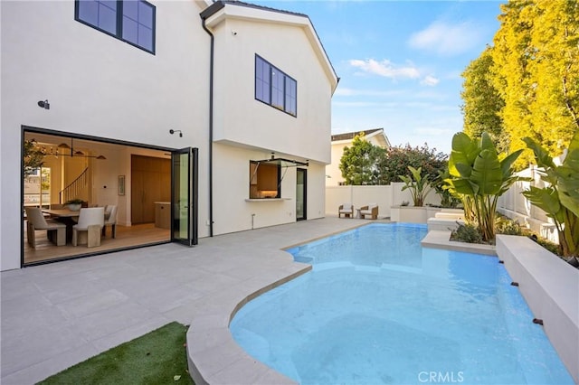 view of pool featuring a patio area