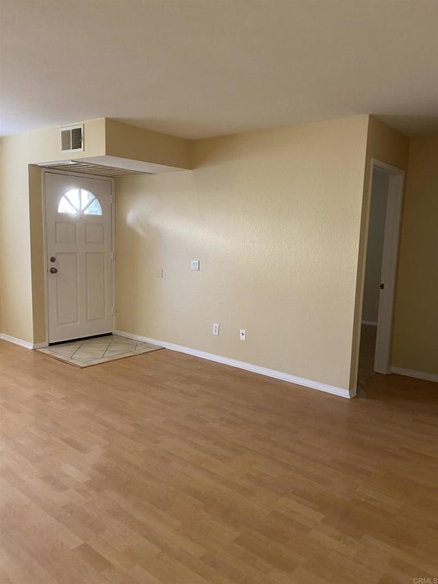 foyer entrance featuring light wood-type flooring