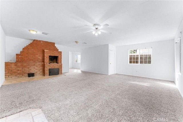 unfurnished living room with light carpet and ceiling fan