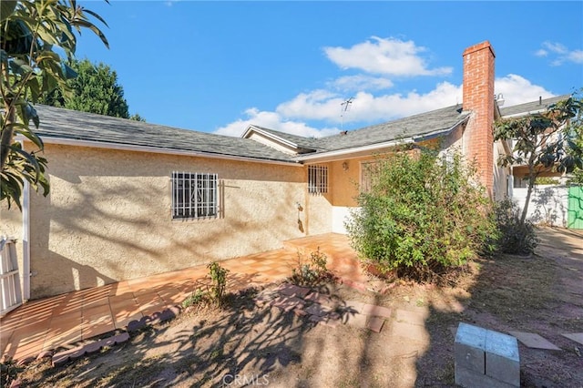 view of front of home featuring a patio