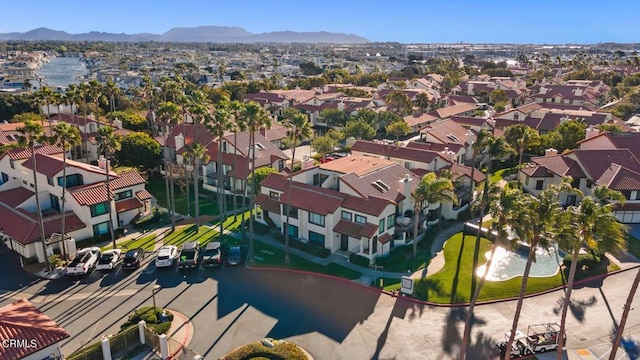 drone / aerial view with a mountain view and a residential view